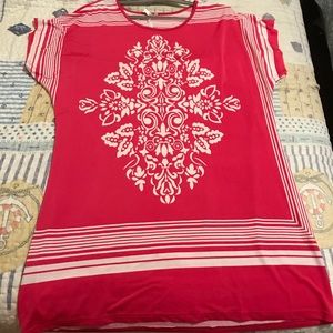 Hot pink stretchy shirt with pretty white pattern